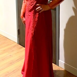 gown worn once at Children’s Hospital Gala, Long sheer sleeve zippered back.